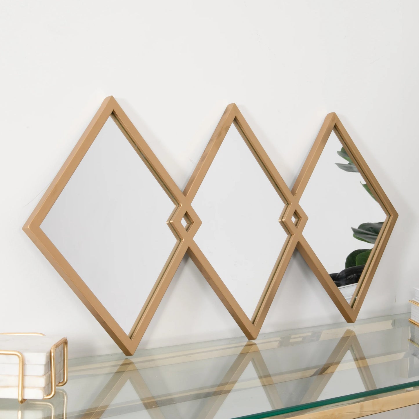 gold shaped mirrors