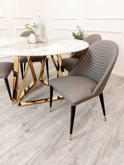 round sintered stone top and gold base dining table